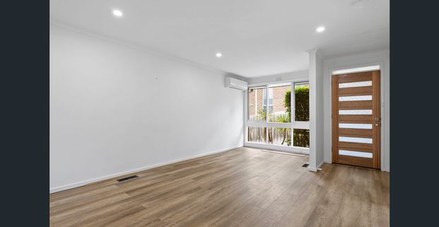 Freshly renovated low maintenance living at prime location - Photo 1