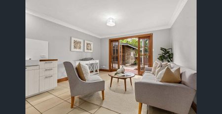 Serene Living Awaits- Embrace Family Life in a Two-Level Home on a Beautifully Landscaped Block. - Photo 3