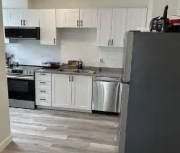 Fully Renovated 2 bedroom LEGAL BASEMENT SUITE!! in inner City of K... - Photo 1