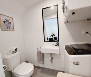 Stylish 2-Bedroom Home with Modern Comforts & Private Outdoor Spaces - Photo 5