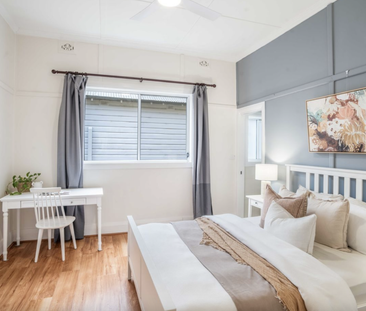 Charming Family Four Bedroom Home in Prime Location - Photo 6