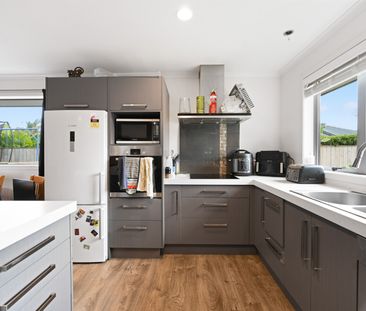 Set back from the road for added privacy, this well‑positioned, fou... - Photo 2