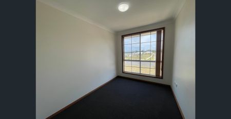 4-Bedroom Home with Double Carport - Photo 2