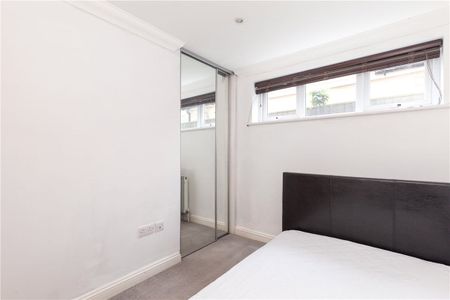 Two bedroom ground floor apartment with private rear garden and parking. - Photo 3