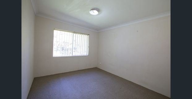 Two Bedroom Unit with Air Conditioner & Garage - Photo 1