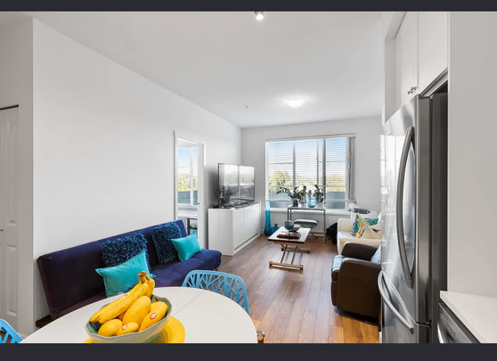 Immaculate Two Bedroom and Den with Parking and Storage - Photo 1