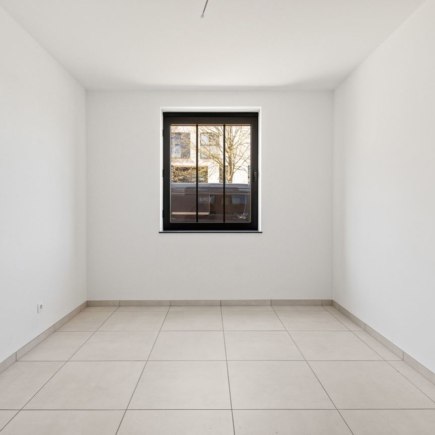 Gelijkvloers nieuwbouwappartement vlakbij het centrum. - Foto 1