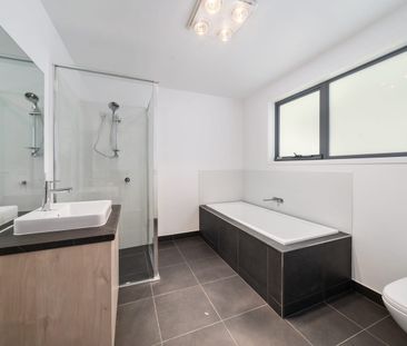 Modern 3 Bedroom Unit In Great Location - Photo 3