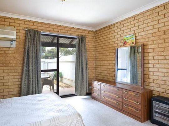 Fully Furnished Small & Easy to maintain Unit! - Photo 1