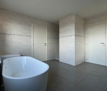 Woning met polyvalente ruimte en 4 slaapkamers - Photo 6