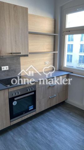 Helle 3 Zimmerwohnung mit Einbauküche und Gartenbenutzung - Foto 3