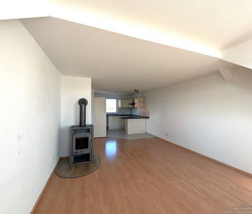 Dachgeschosswohnung – mit Kamin & offener Küche - Photo 2