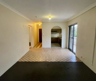 Large Unit in a Convenient Location with Garage - Photo 1
