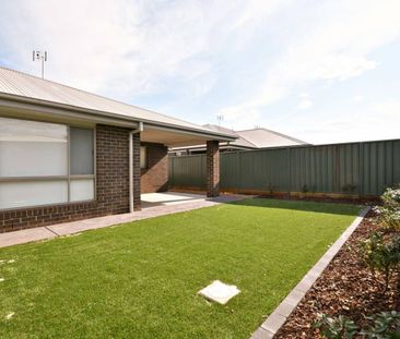 Low Maintenance Living - Three-bedroom home - Photo 1