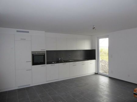 Appartement de 2,5 pièces au rez avec jardin - Photo 2