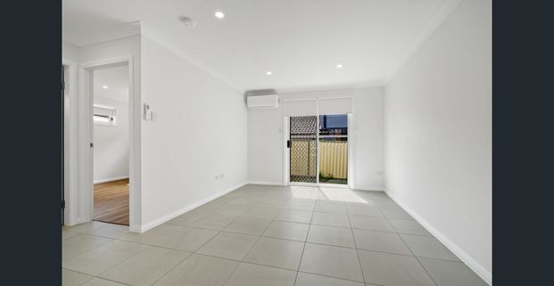 An Ideal Low-Maintenance Home in a Family-Friendly Location - Photo 1