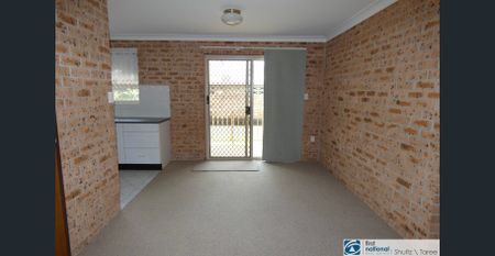 Well Appointed Ground Floor Two Bedroom Unit - Photo 2