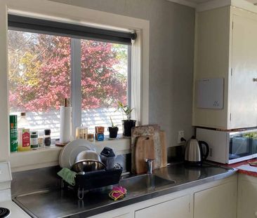 Charming Three-Bedroom Home Close to Town! - Photo 2