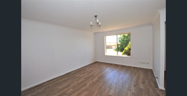 THREE BEDROOM UNIT IN A SOUGHT AFTER LOCATION - Photo 1