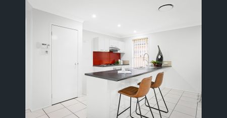 Modern Family Living in a Prime Quakers Hill Location - Photo 2