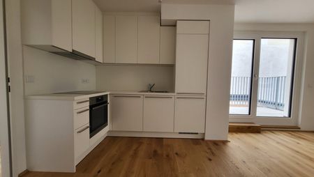 Smarte 2-Zimmer-Wohnung mit Hofterrasse: Hochwertige Ausstattung + Ausgezeichnetes Raumkonzept - Photo 2
