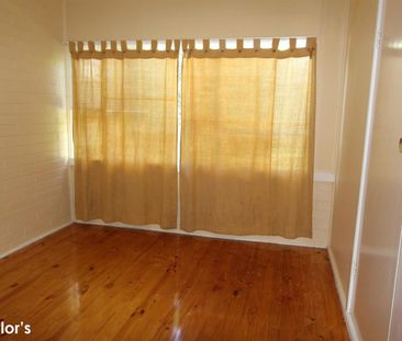 SPACIOUS FAMILY HOME WITH MULTIPLE LIVING AREAS & GREAT OUTDOOR SPACE - Photo 4