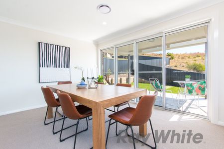 2 Kuraman Close, Macquarie Hills NSW 2285 - House For Rent | Domain - Photo 5