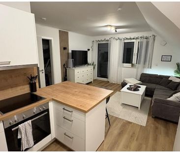 Gemütliche 2-Zimmer-Dachgeschosswohnung in begehrter Lage von Stade - Foto 1