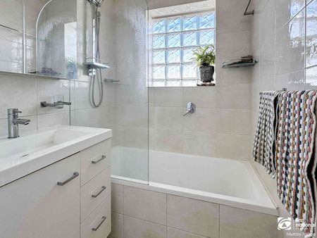 Central Living with Comfort and Space - Photo 5