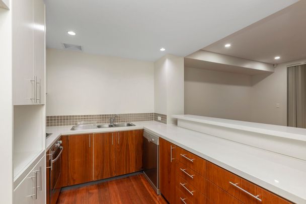 Spacious Four-Level Townhouse Offering Comfort, Style & Convenience - Photo 1