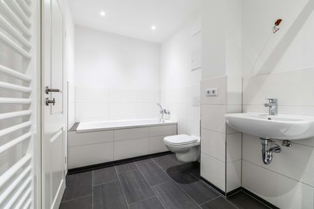 hochwertig ausgestattet * Fußbodenheizung * Balkon * Wanne+Dusche* Designbelag - Foto 2