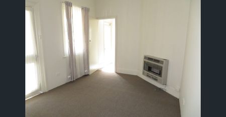 CENTRAL AND RENOVATED 2 BEDROOM SEMI! - Photo 2