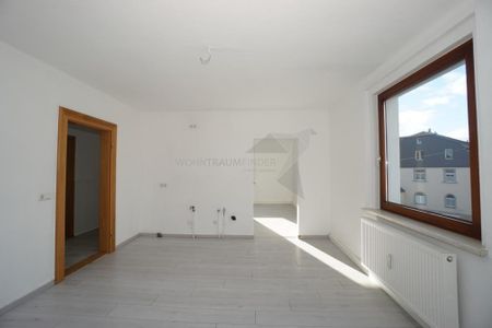 Geräumige 2-Raum-Wohnung mit großer Wohnküche, Gartennutzung und PKW-Stellplatz - Photo 2