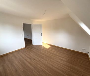 Gemütliche Dachgeschosswohnung in Waldrandlage - Foto 1