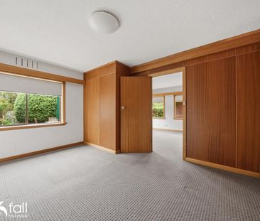 Well presented unit offering low maintenance living - Photo 1