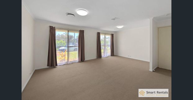 Freshly Updated Coastal Convenience! - Photo 1