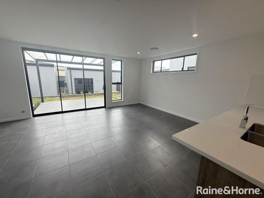 Modern Family Comfort Meets Sophisticated Design - Photo 1