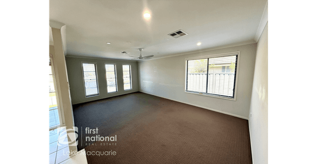 Modern 4-Bedroom Home with Multiple Living Areas - Photo 1