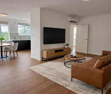 Fully Renovated Apartment with Light-Filled Interiors - Photo 1