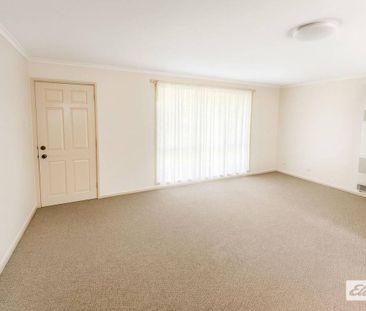 Freshly updated and low maintenance living - Photo 1