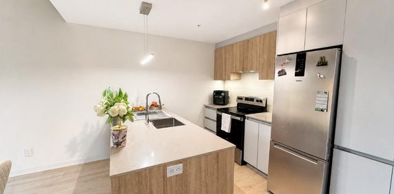 1997.00/mois - Cession de bail – 3½ moderne à Brossard | Accès direct REM | Quartier DIX30 - Photo 2