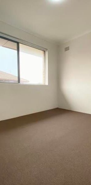 CONVENIENTLY LOCATED TWO BEDROOM UNIT - Photo 1