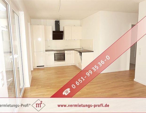 Schöne Erdgeschosswohnung mit barrierefreiem Bad und toller Terrasse in direkter Mosellage! - Foto 1