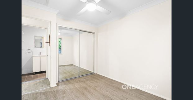 NEAT AND FUNCTIONAL TWO BEDROOM WITH YEAR ROUND COMFORT - Photo 1