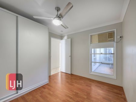 GREAT AIR CONDITIONED FOUR BEDROOM LOW SET HOME! - Photo 3