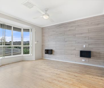 Open the door to relaxed family living with multiple living zones - Photo 1