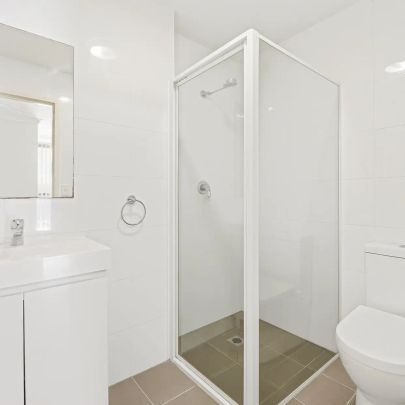 Modern & Fresh: Renovated 2-Bed Unit with Brand New Floating Floors - Photo 1