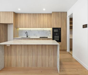 Luxury Three-Storey Townhouse in the Heart of McKinnon Secondary Co... - Photo 6