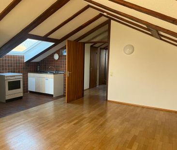 Helle 2-Zimmer-Dachgeschosswohnung in Stegen zu vermieten - Photo 1