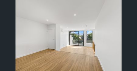 Sunlit Spaces and Elevated Living - Photo 4